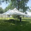 Outdoor Graduation party under 20' x 30' rope and pole tent in East Moline, IL