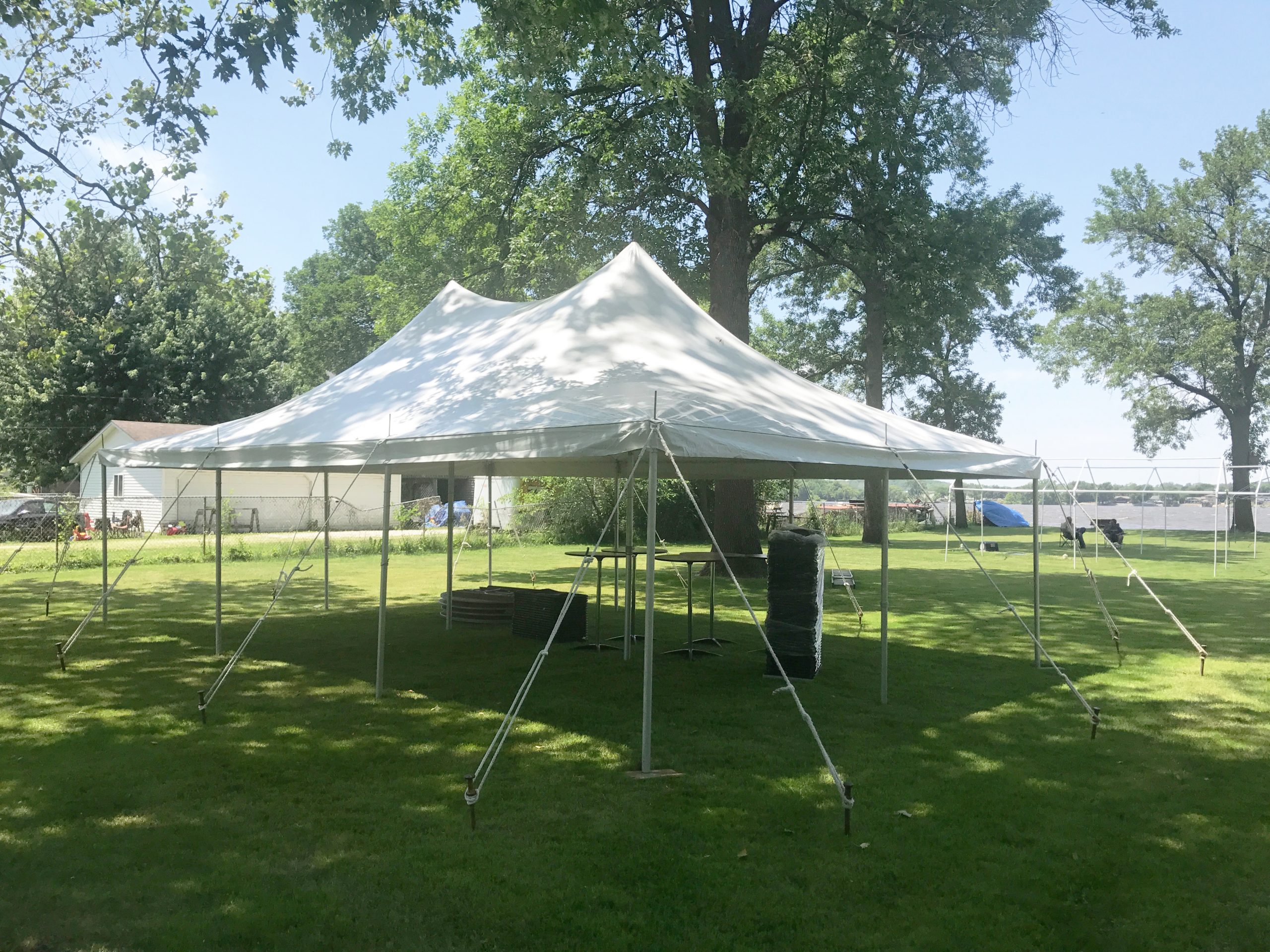 Outdoor Graduation party under 20' x 30' rope and pole tent in East Moline, IL