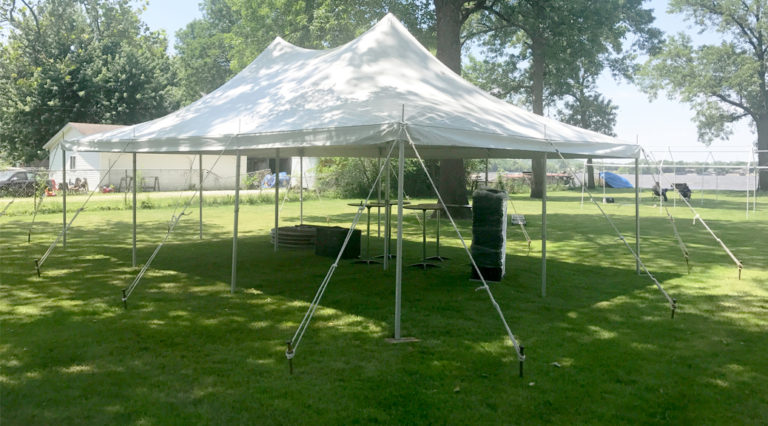 Outdoor Graduation party under 20' x 30' rope and pole tent in East Moline, Illinois