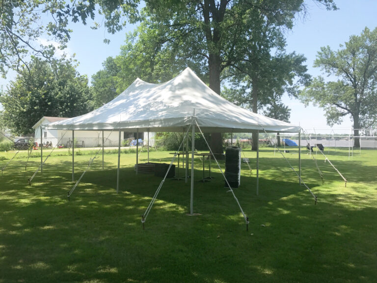 Outdoor graduation party under 20x30 rope and pole tent in East Moline, Illinois.
