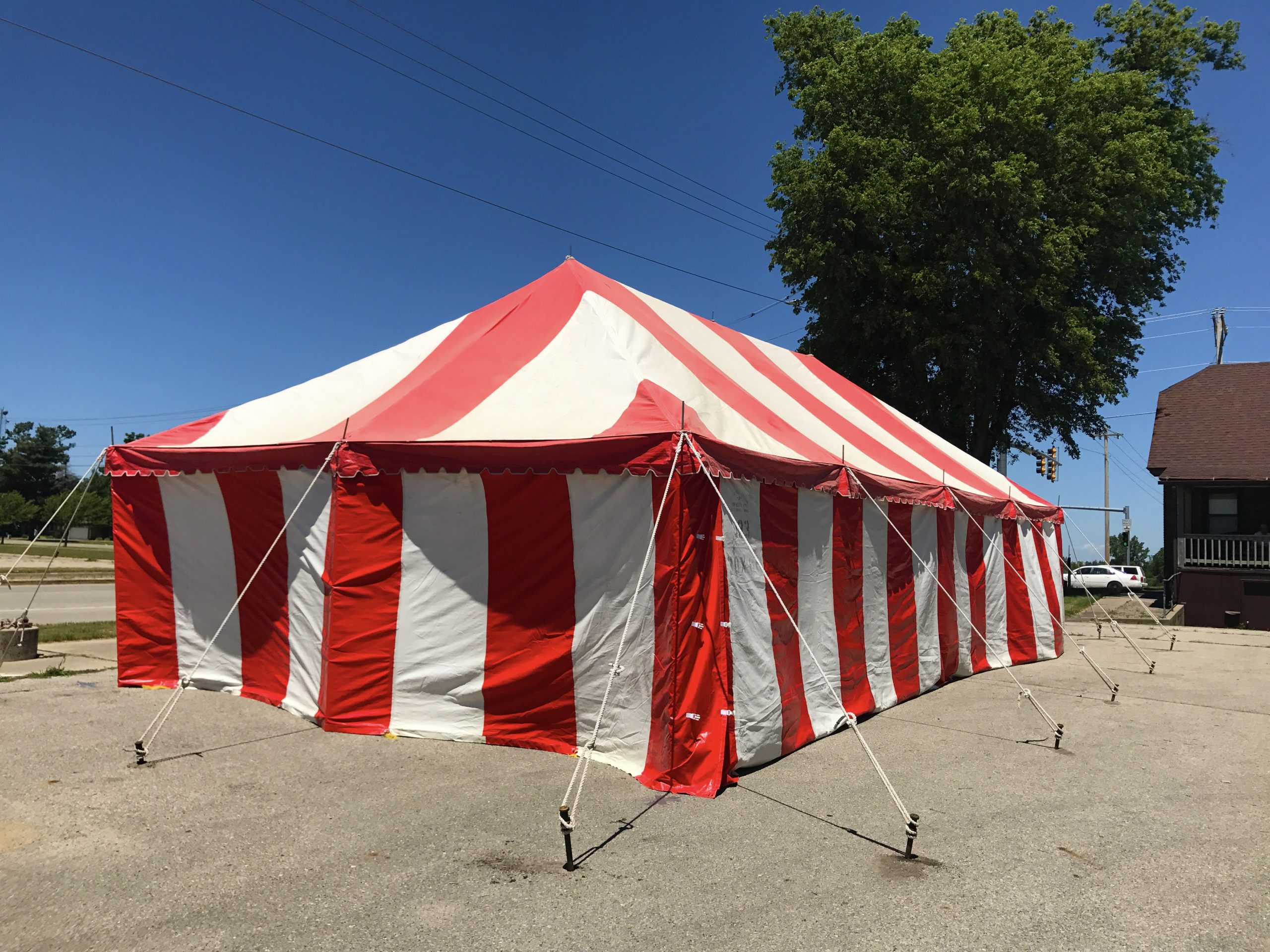 Outside of 20' x 40' rope and pole Fireworks tent for Ka-Boomers Fireworks in Newton, Iowa