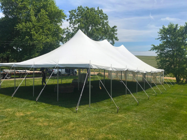 Outside of the 30' x 60' rope and pole wedding tent in De Witt, Iowa