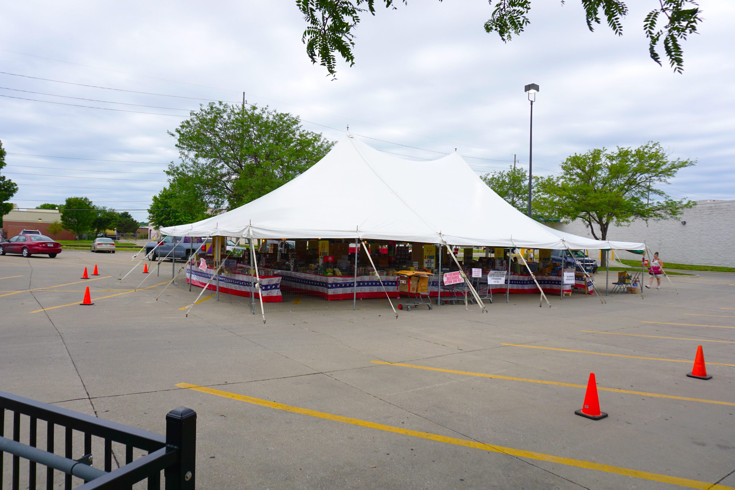 Outside of the 40' x 60' rope and pole tent for Fireworks Stand Hy-Vee 1720 Waterfront Dr, Iowa City, IA 52240