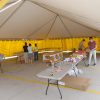 Setting up a fireworks stand at Walmart Supercenter in Iowa City, IA under a 30' x 45' frame tent