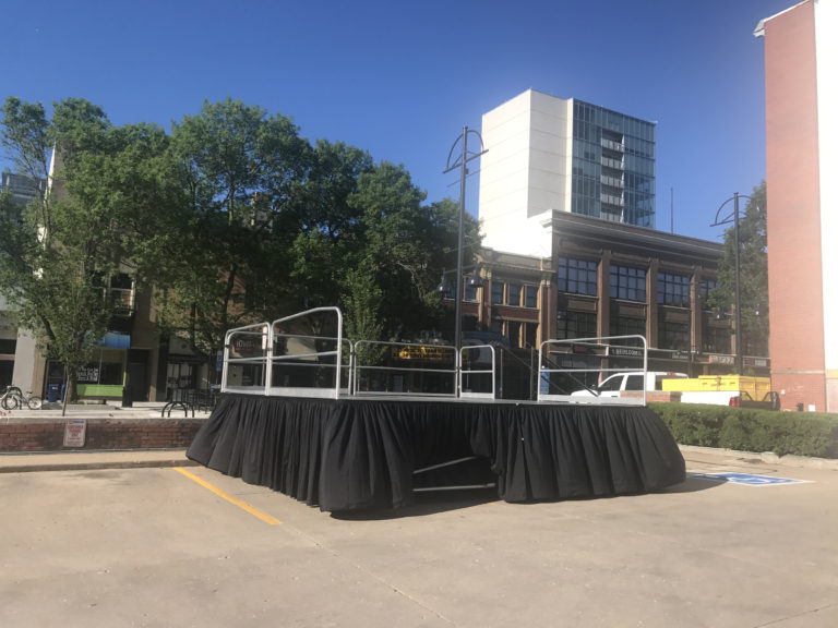 Setup of our 16' x 16' stage on 48 legs in downtown Iowa City for the Iowa City Block Party in 2017