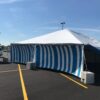 Side of 30' x 60' frame tent at the Walmart Supercenter in Cedar Rapids, Iowa with blue and white side walls
