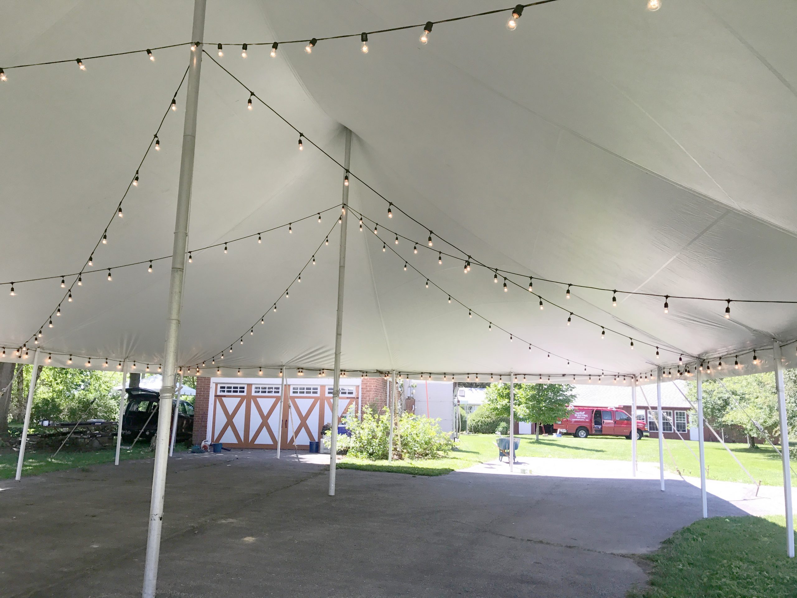Under the 40' x 60' rope and pole wedding tent in Walcott, IA