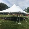 View of the 30' x 40' rope and pole tent for an outdoor Wedding in Iowa