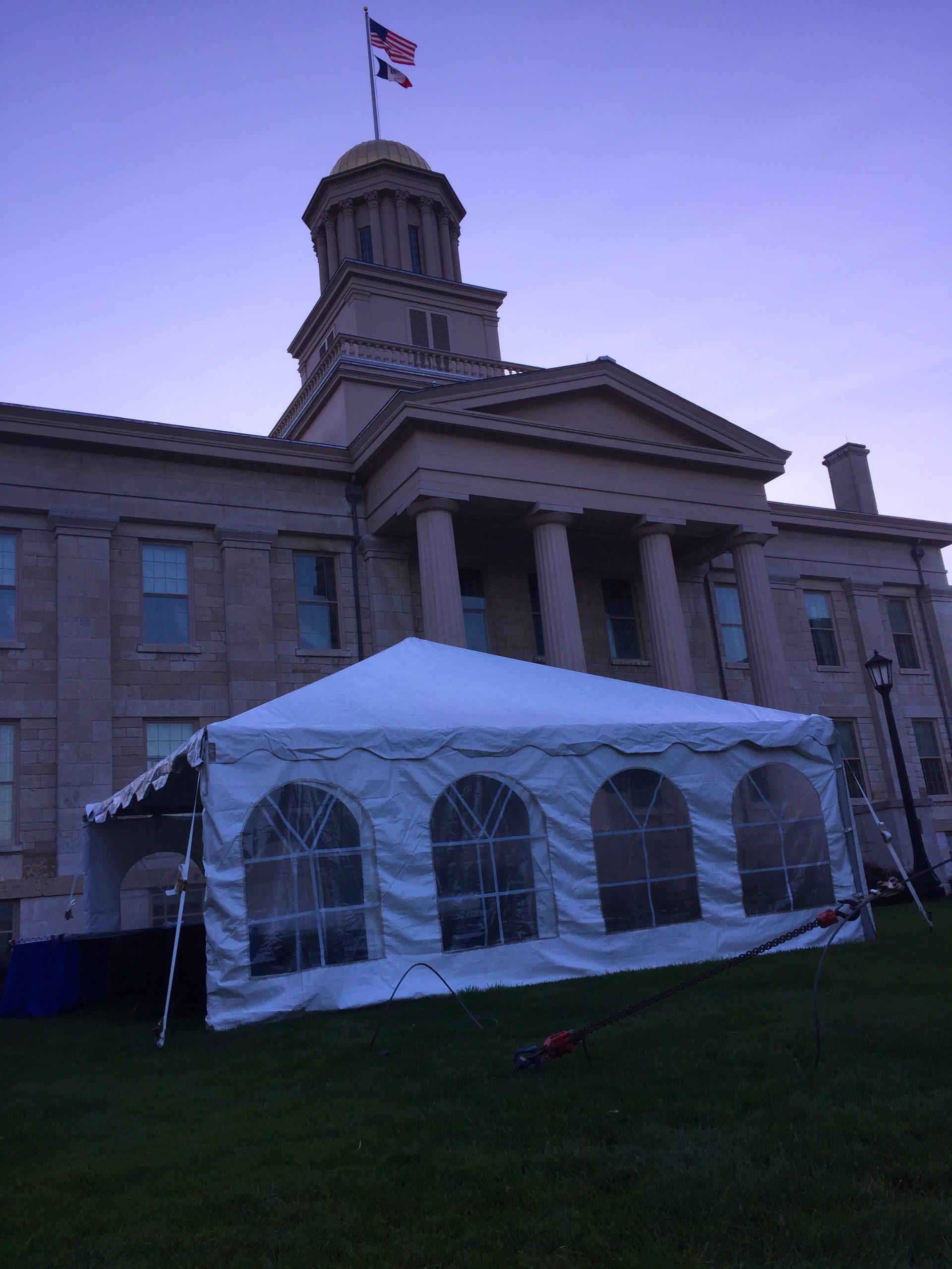 Frame tent set up for the musicians at the Iowa City Jazz Festival 2017 set up at night