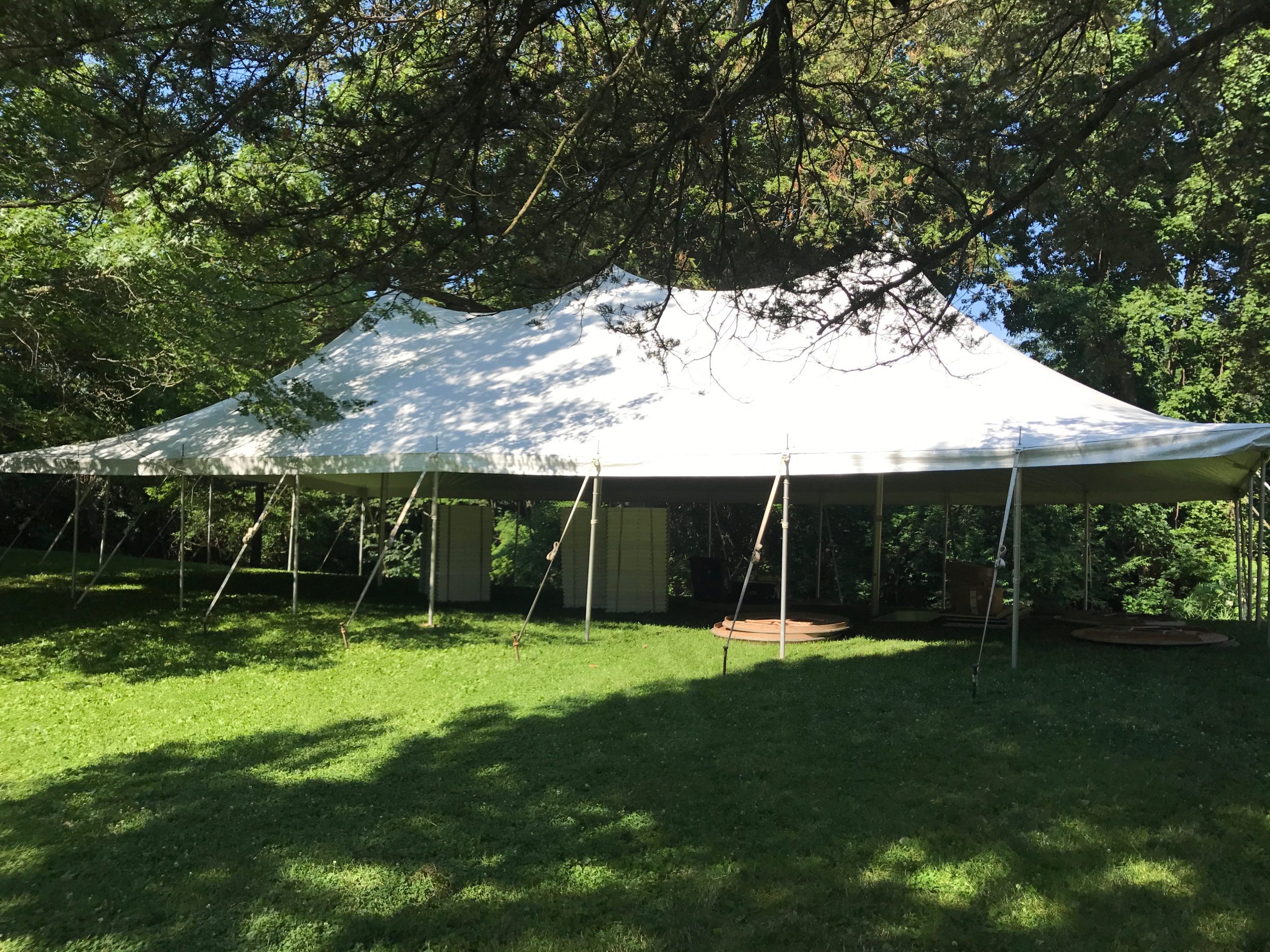 Side view of our 30' x 60' rope and pole wedding tent in Mount Vernon, Iowa