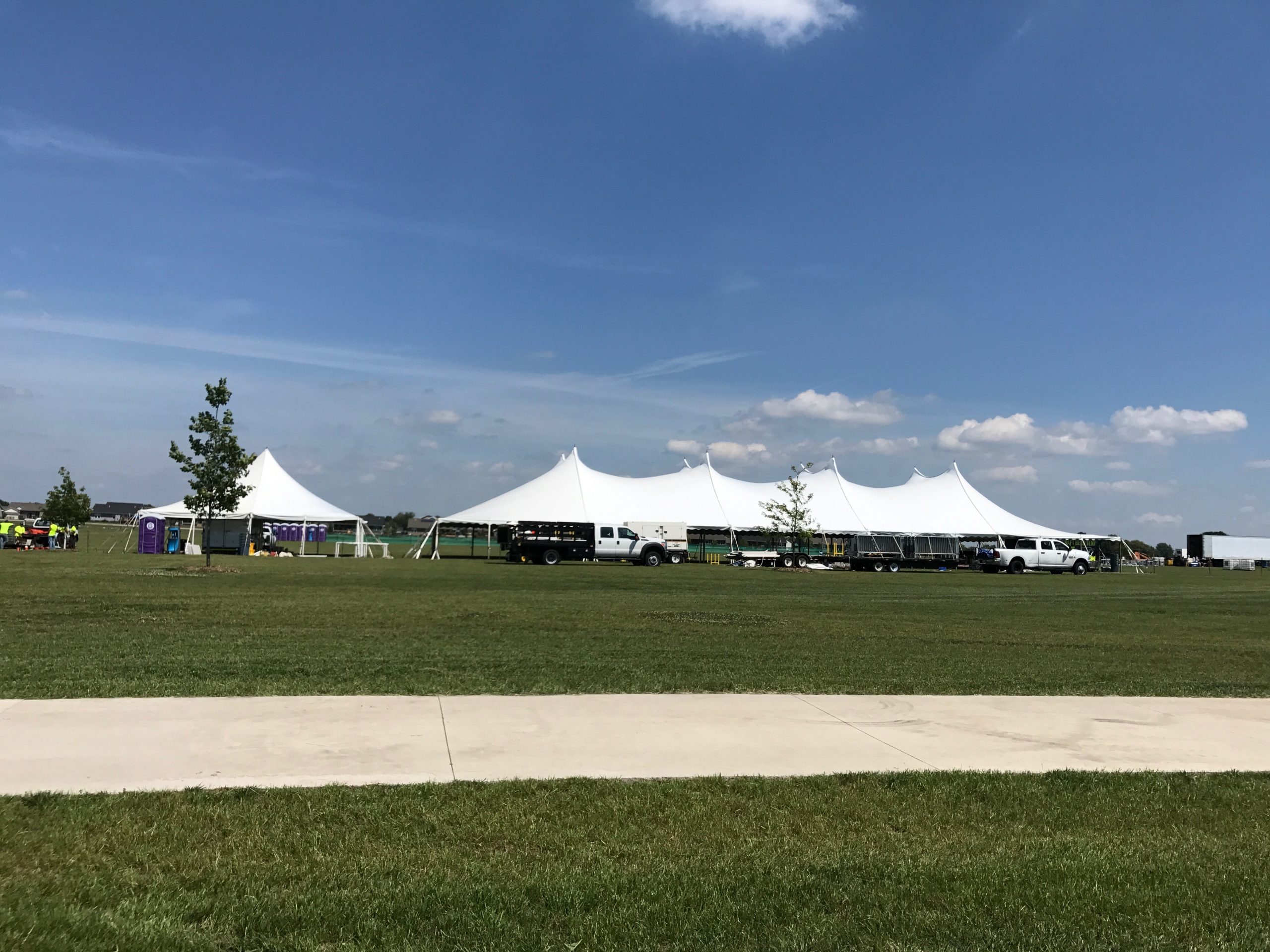 View of rope and pole tents at the North Liberty Blues & BBQ festival at Centennial Park in North Liberty, Iowa