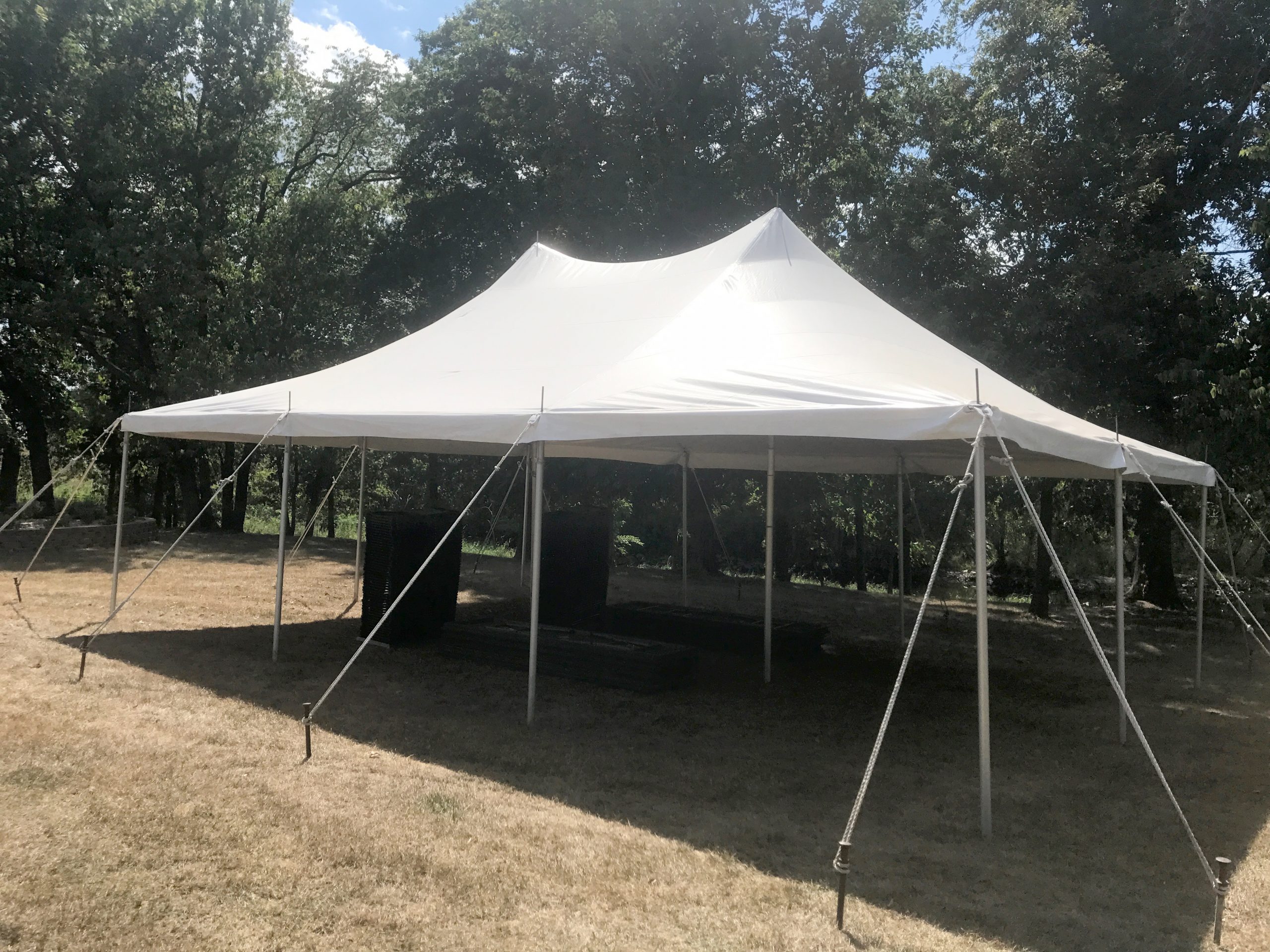 20' x 30' rope and pole tent for Outdoor corporate event setup for West Liberty foods in Libertyville, Iowa
