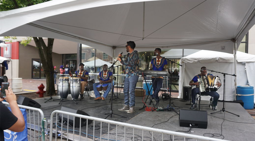 Band on tented stage at the 2017 Iowa Soul Festival in Iowa City. IA (Summer of the Arts)