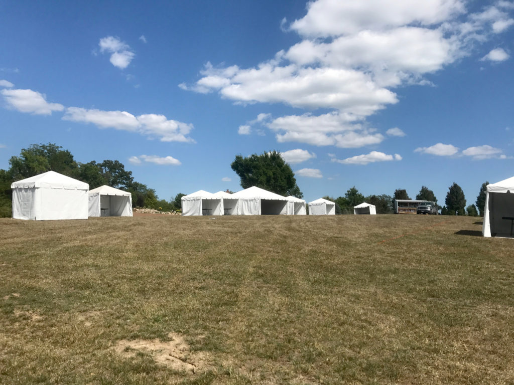 Multiple tents for an Outdoor corporate event setup for West Liberty foods in Libertyville, Iowa