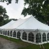 Outside of a 40' x 80' Rope and Pole wedding tent in Carroll Iowa
