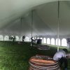 Under a 40' x 80' Rope and Pole wedding tent in Carroll, Iowa
