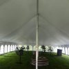 Under the middle of a 40' x 80' Rope and Pole wedding tent in Carroll, Iowa