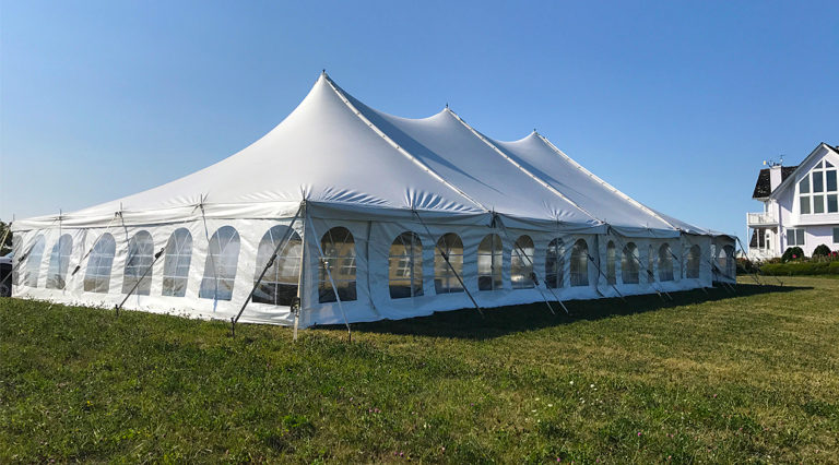 40' x 80' rope and pole wedding tent setup in Fairfield, Iowa