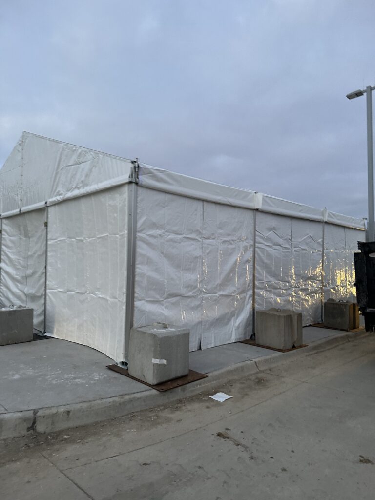 Corner of 30' x 30' Clearspan Event Structure with sidewalls in Des Moines for Baker Electric
