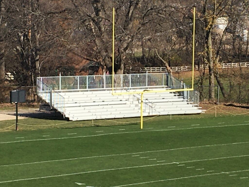 Towable bleachers in the end zone in Mount Vernon, Iowa at First Street Community Center Football Stadium Field
