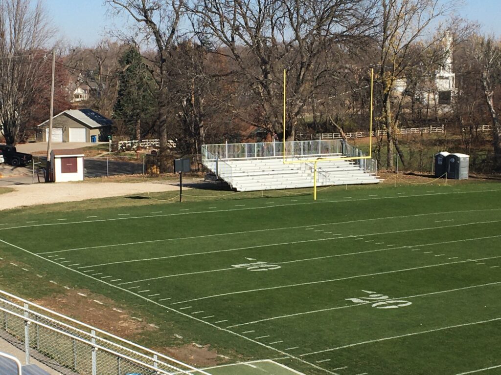 Towable bleachers in the end zone in Mount Vernon, Iowa at First Street Community Center Football Stadium and Field