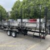Side (when towing), back of 7-Row bumper tow bleacher - seats 107 people - 26.5′ Long - customer pick up