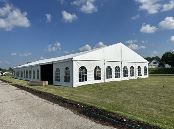 18m x 35m (60′ x 114′) Losberger clearspan temporary event tent structure for a wedding reception in Iowa City near Solon, IA