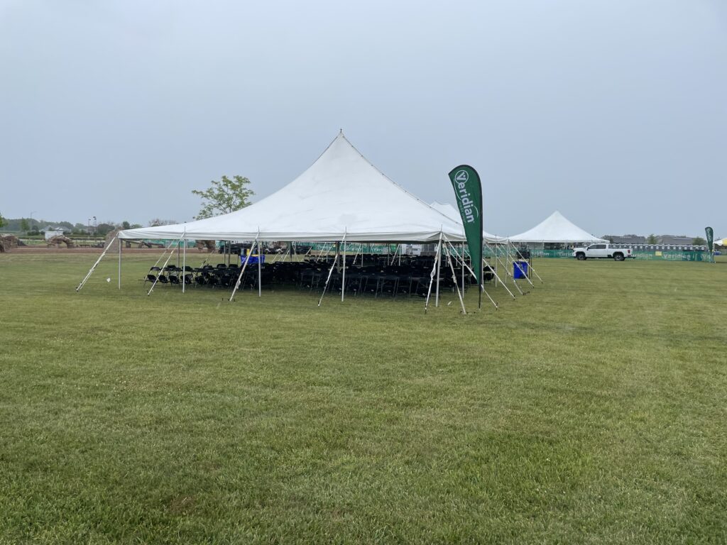 40′ x 40′ Rope and Pole Tent and one 40′ x 40′ Rope and Pole Tent on the right