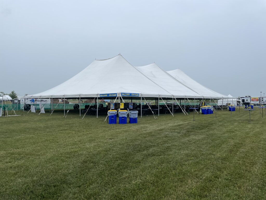 80' x 120' twin-pole rope and pole tent at at the North Liberty Blues & BBQ music festival