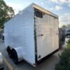 Back left and door on the back of 7' x 14' Enclosed Cargo Trailer rental vin8278