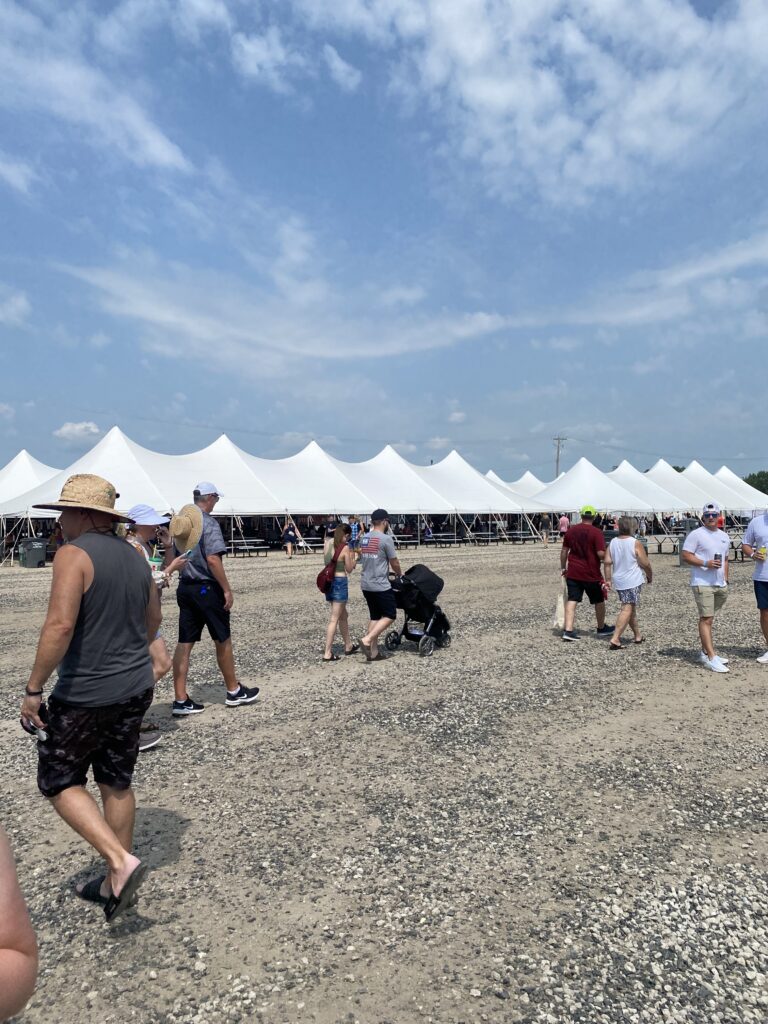 Multiple 40' x 120' rope and pole tent at the Hy-Vee IndyCar Races at Iowa Speedway in Newton, IA