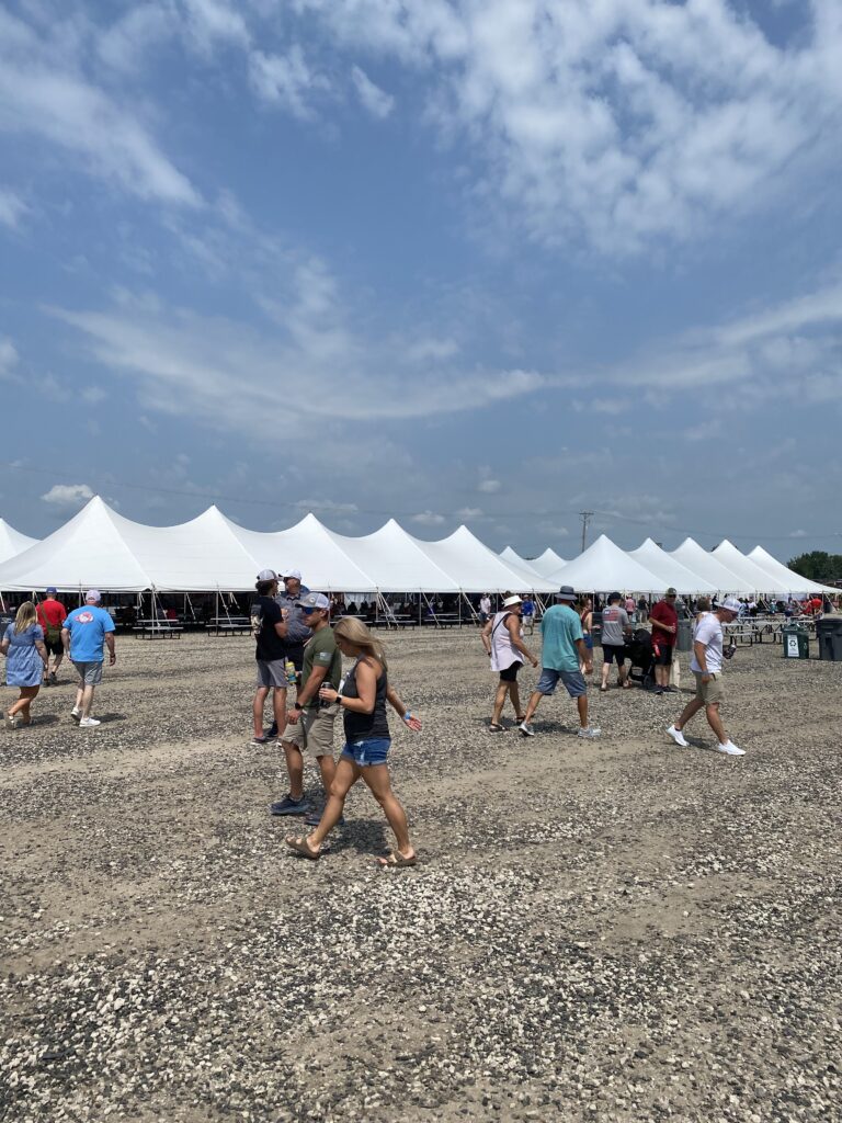 Multiple 40' x 120' rope and pole tent at the Hy-Vee IndyCar Races at Iowa Speedway in Newton, Iowa