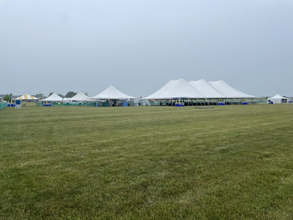 Multiple tents set up for Blues and BBQ music event in North Liberty, Iowa