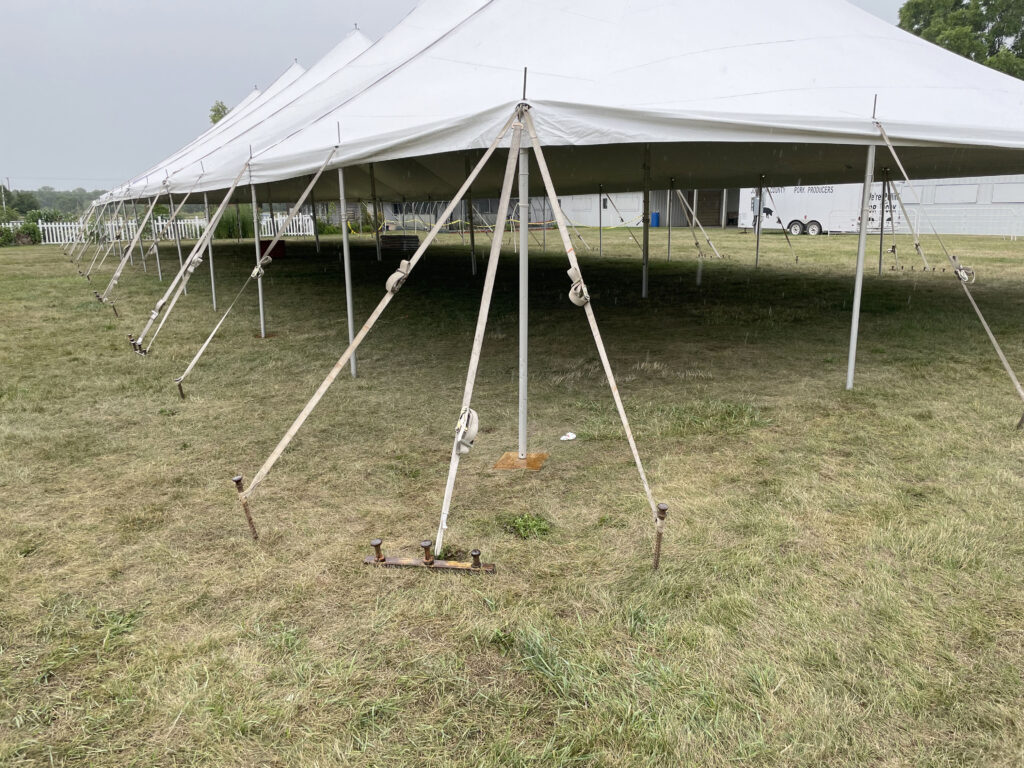 Outside corner of 40' x 120' rope and pole tent at the Get WET Get WILD Foam Party at Johnson County Fairgrounds in Iowa City, IA