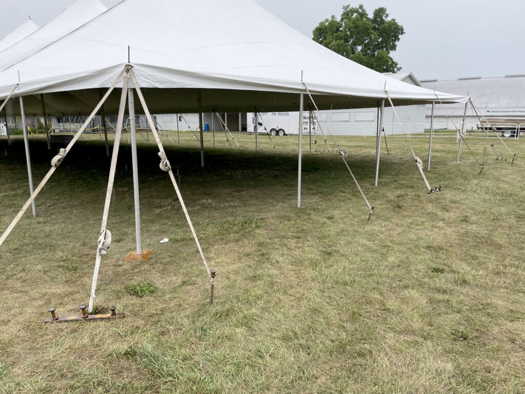 Outside corner of 40' x 120' rope and pole tent at the Johnson County Fairgrounds in Iowa City, IA