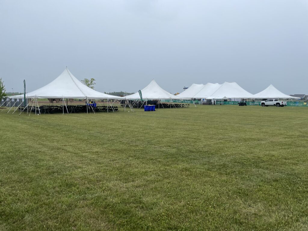Two 40′ x 40′ Rope and Pole Tents on the left, 80′ x 120′ Rope and Pole Tent in the middle and one 40′ x 40′ Rope and Pole Tent on the right