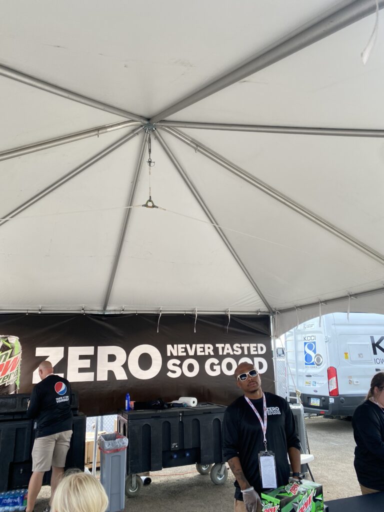 Under the 20' x 20' frame tent for Pepsi Co. at the Hy-Vee IndyCar Races at Iowa Speedway in Newton, Iowa