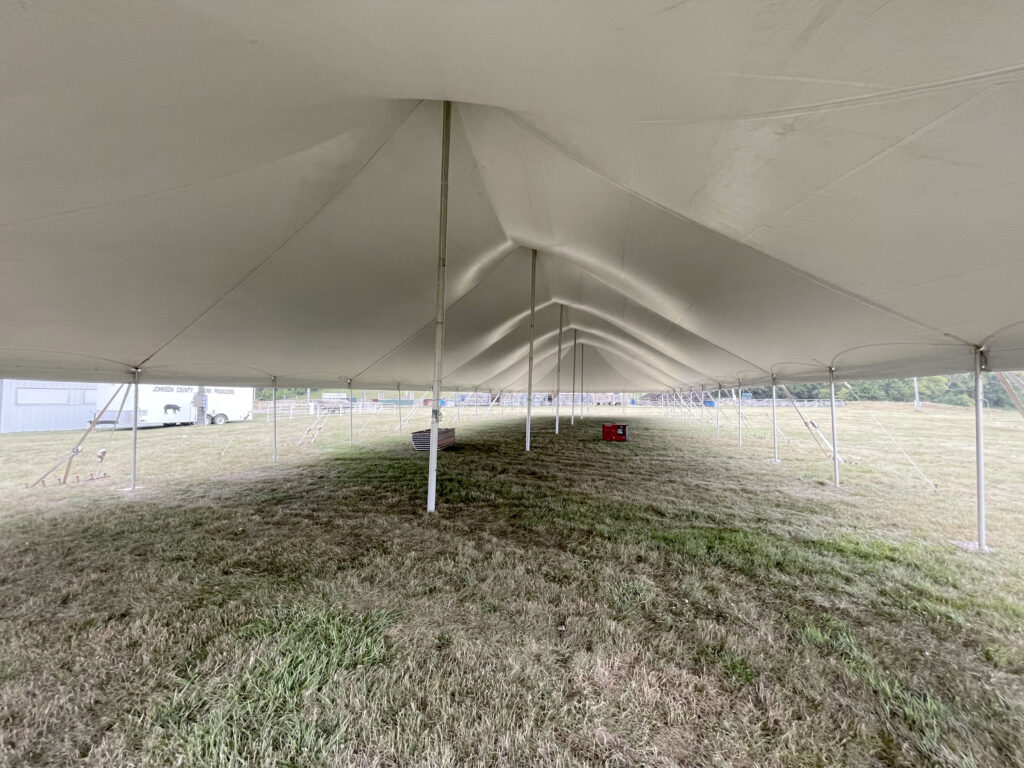 Under the 40' x 120' rope and pole tent at the Get WET Get WILD Foam Party at Johnson County Fairgrounds in Iowa City, IA