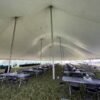 Under the 80′ x 120′ Rope and Pole Tent at the Blues and BBQ event in Iowa