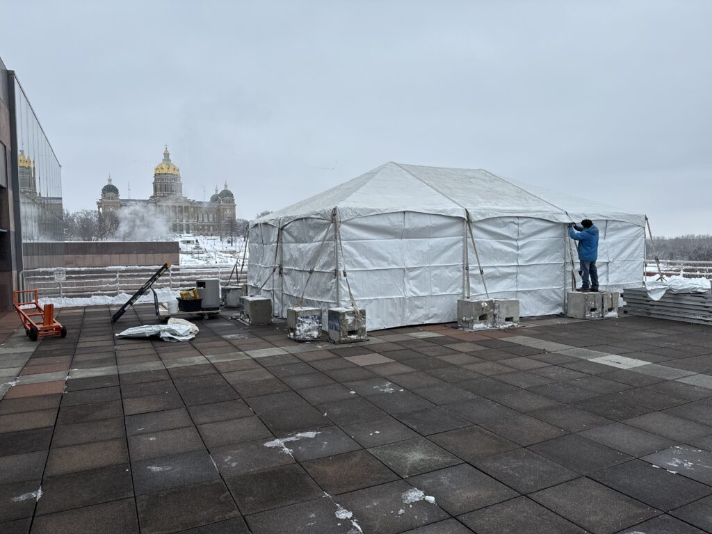 20' x 30' frame tent on the 3rd-floor terrace from the State Historical Building in Des Moines, Iowa overlooking the Iowa State Capitol.