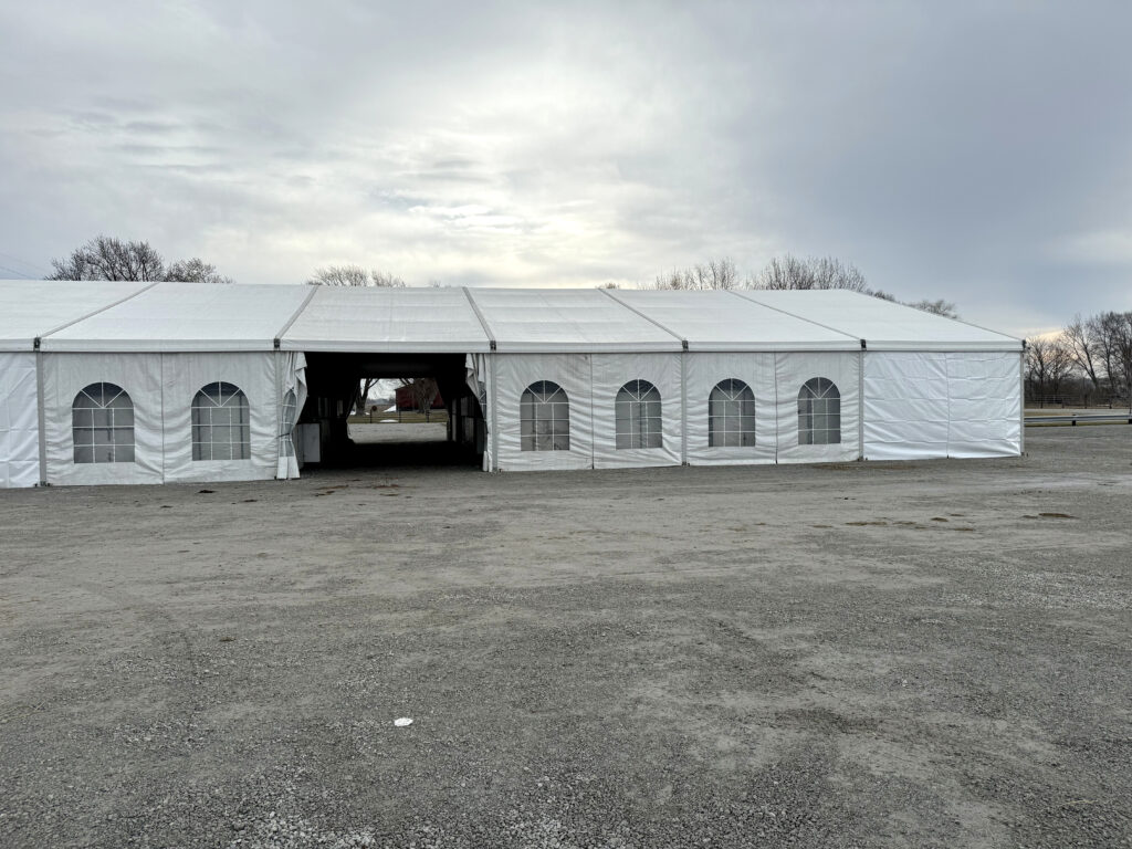 60' x 180' Clearspan Temporary Event Structure for the Special Workhorse Sale Kalona, Iowa in 2024. View of middle walkthrough area.