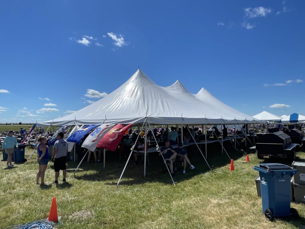 30' x 60' rope and pole tent at Quad City Air Show 2024 in Davenport, IA. Hospitality Chalet