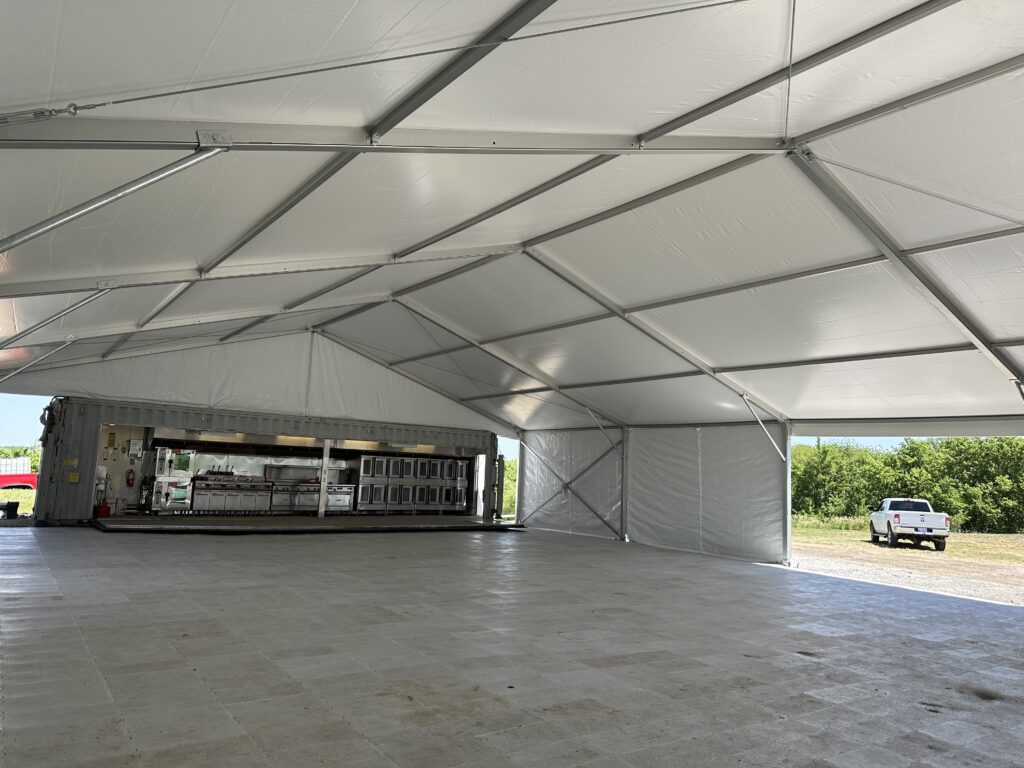 50' x 66' clearspan event structure and event flooring- 2024 NASCAR Race Weekend at Iowa Speedway in Newton, Iowa - Liri tent