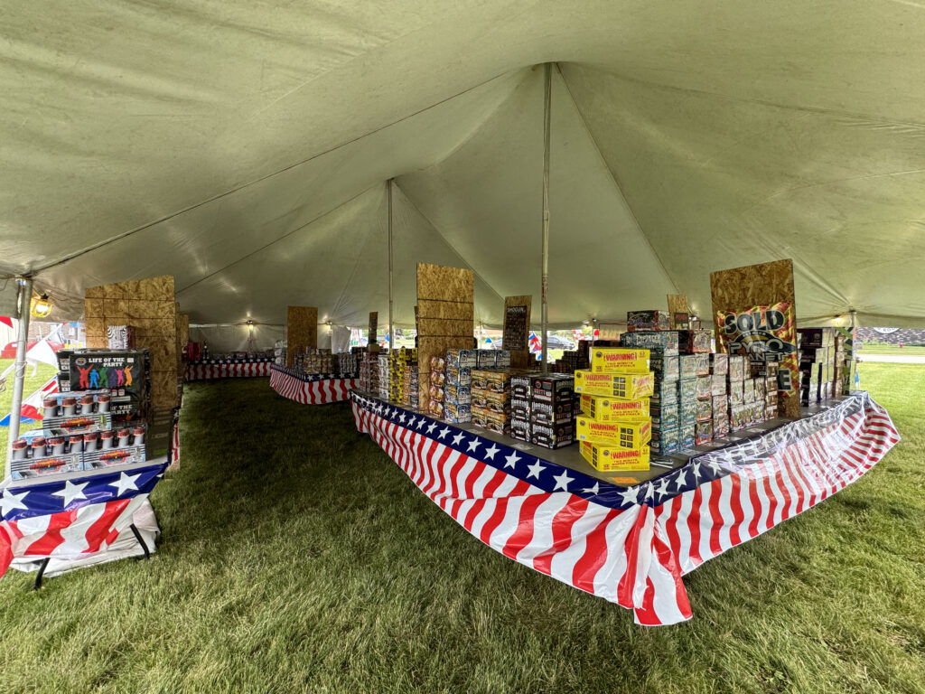 Fireworks for sale under the fireworks tent in North Liberty, Iowa. 30' x 40' Rope and Pole Tent.