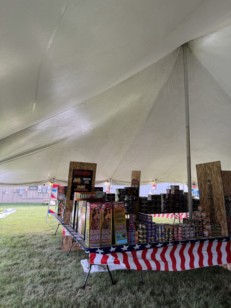 Fireworks for sale under the fireworks tent in North Liberty, Iowa. 30' x 40' Rope and Pole Tent.