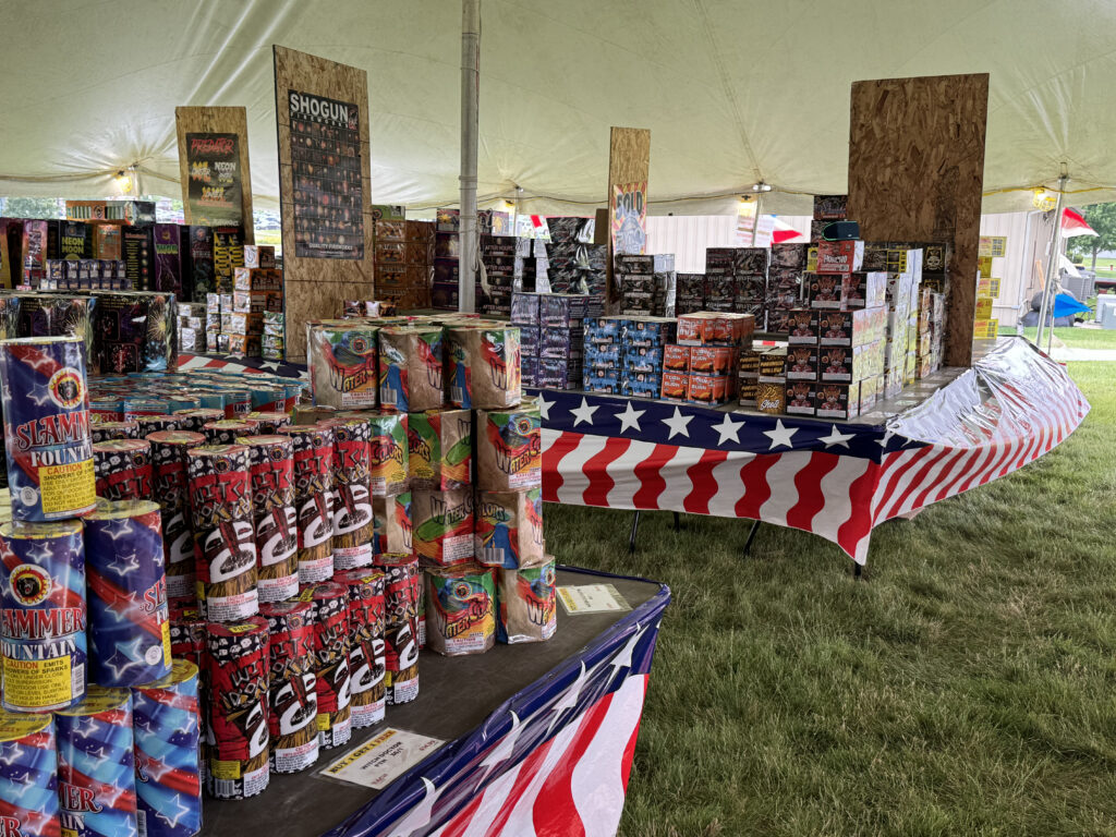 Fireworks for sale under the tent in North Liberty, Iowa. 30' x 40' Rope and Pole Tent.