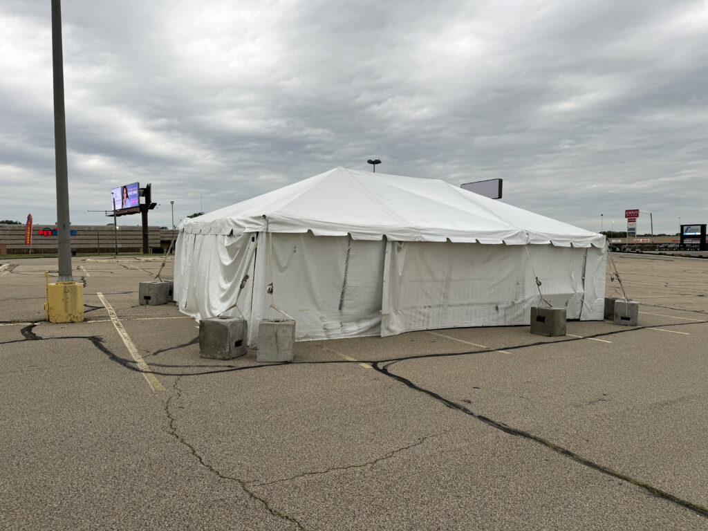 Fireworks tent - 20' x 30' frame tent with Block and Roll tent ballast and Tables in Dubuque, Iowa for Phantom Fireworks