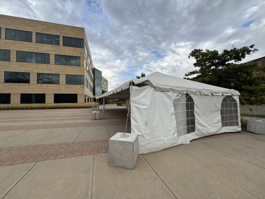 Eight 1,200 blocks on 20' x 60' Frame Event Tent for Homecoming at University of Iowa College of Public Health.