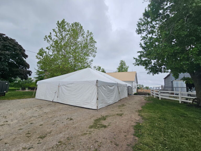 30' x 45' Frame Tent for a Graduation Party in Webster, Iowa with white sidewalls.