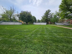 Two 10-Row, 45' Towable Bleachers and one 10-Row 30′Towable Bleacher for an Outdoor Commencement at Grinnell College in Grinnell, Iowa
